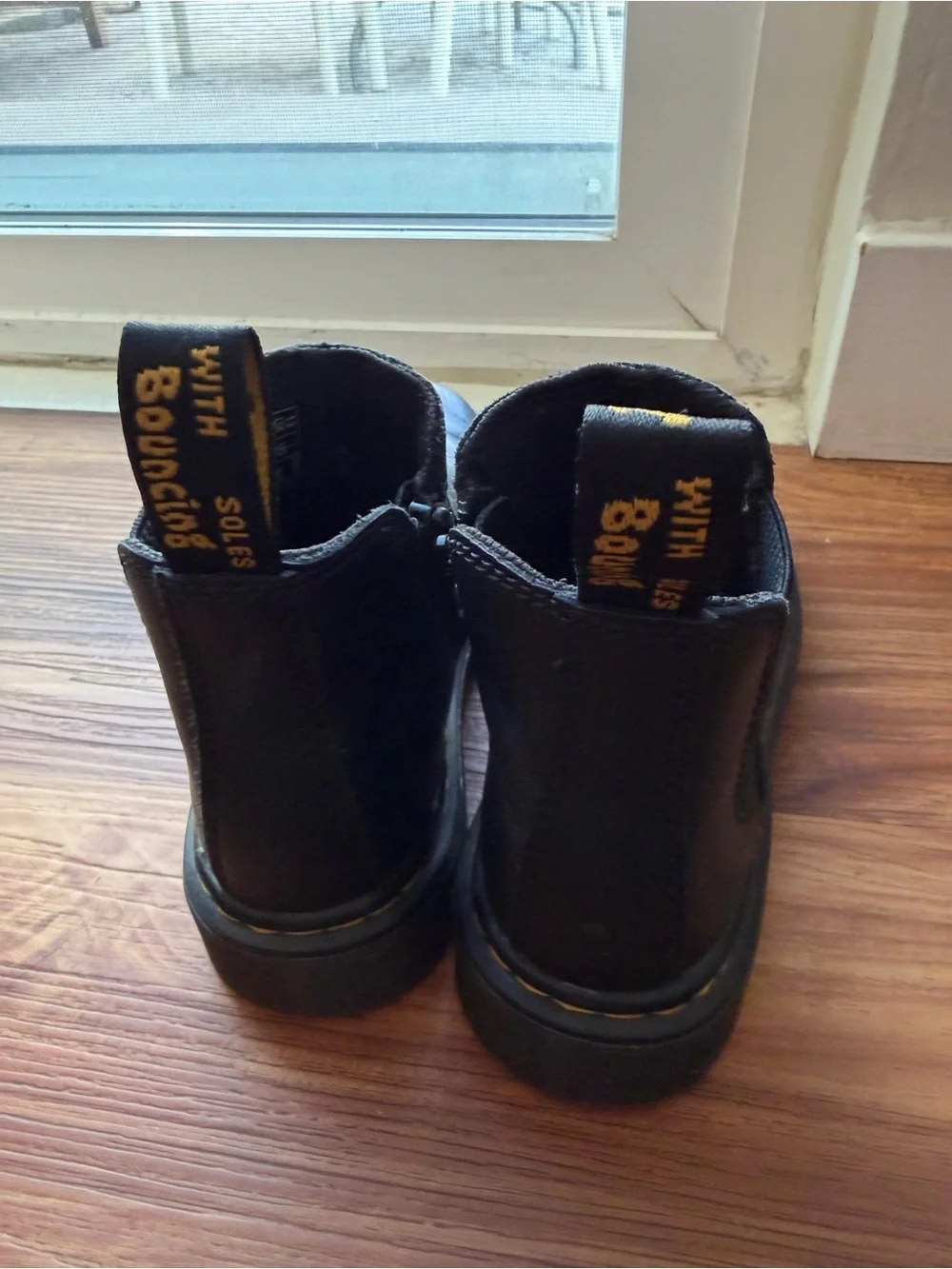 Dr. Martens Kids Black Leather Zip Chelsea Boots with Yellow Heel Loop